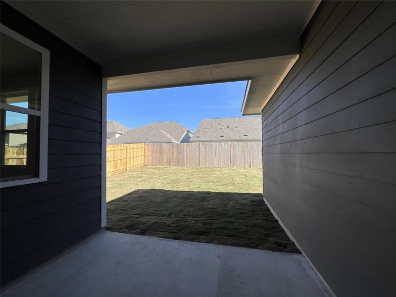Exterior details and patio area of a home in Rolling Glen, Hutto (Image 7).