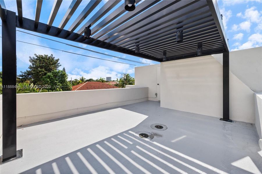 Exterior details and patio area of a home in , Miami (Image 2).