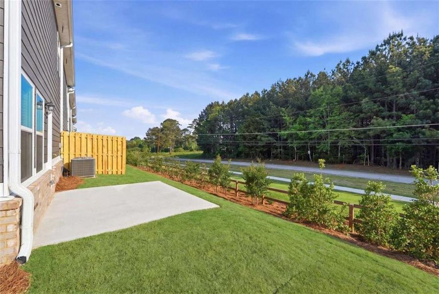 Exterior details and patio area of a home in Parkway James, Snellville (Image 17).
