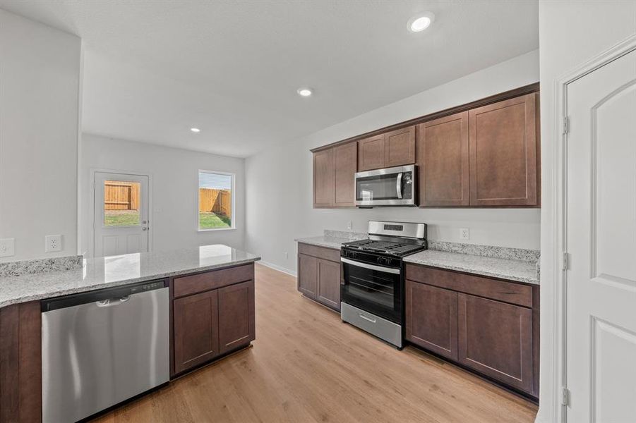 Furnished interior view inside a new home in Big Sky Estates, Ponder (Image 5).