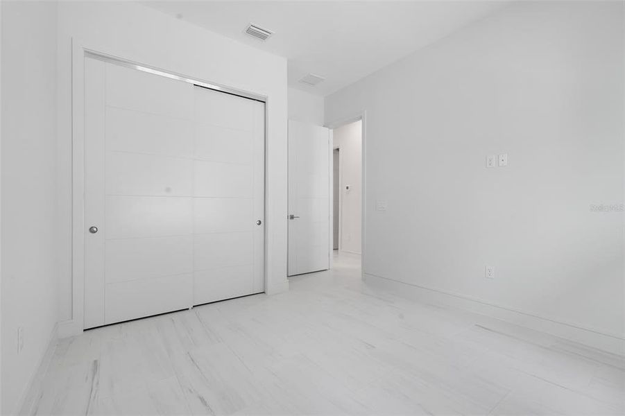 Spacious, unfurnished interior of a new home in Hampton Green at Providence, Davenport (Image 38).