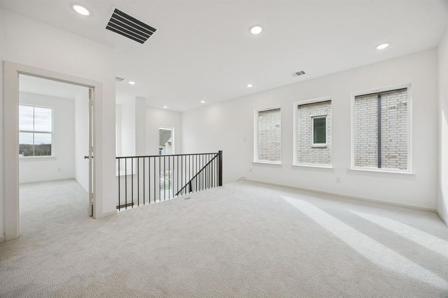 The entire family will enjoy hours of fun time in this spacious, light filled game room!