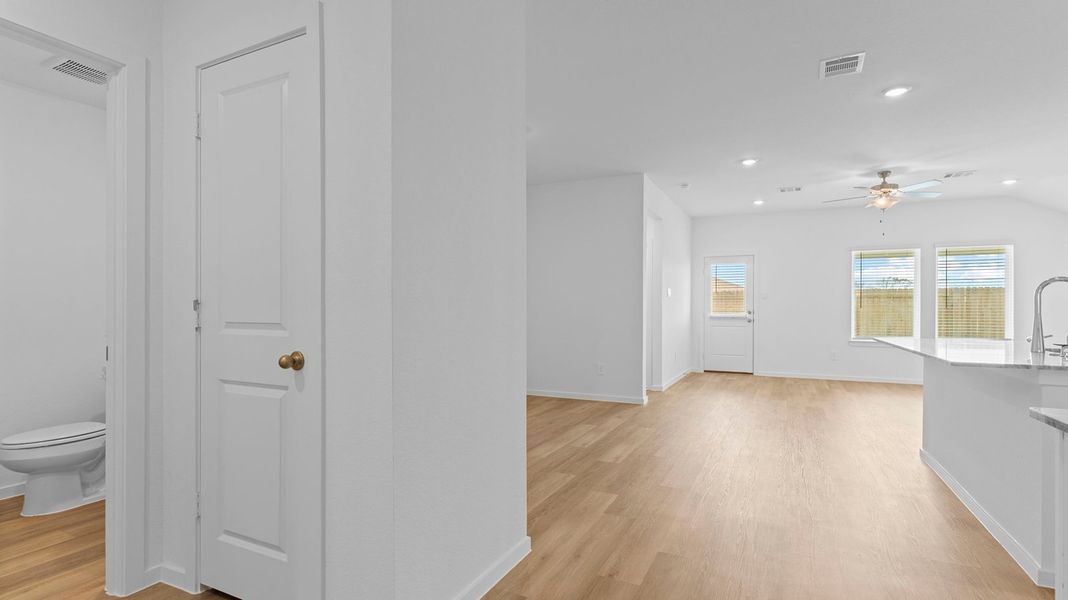 Spacious, unfurnished interior of a new home in Caldwell Crossing, Iowa Colony (Image 12).