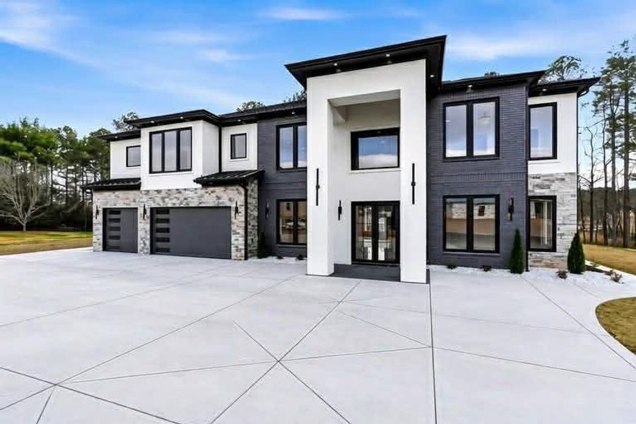 Front exterior of a new home in , Buford, GA, highlighting curb appeal (Image 27).