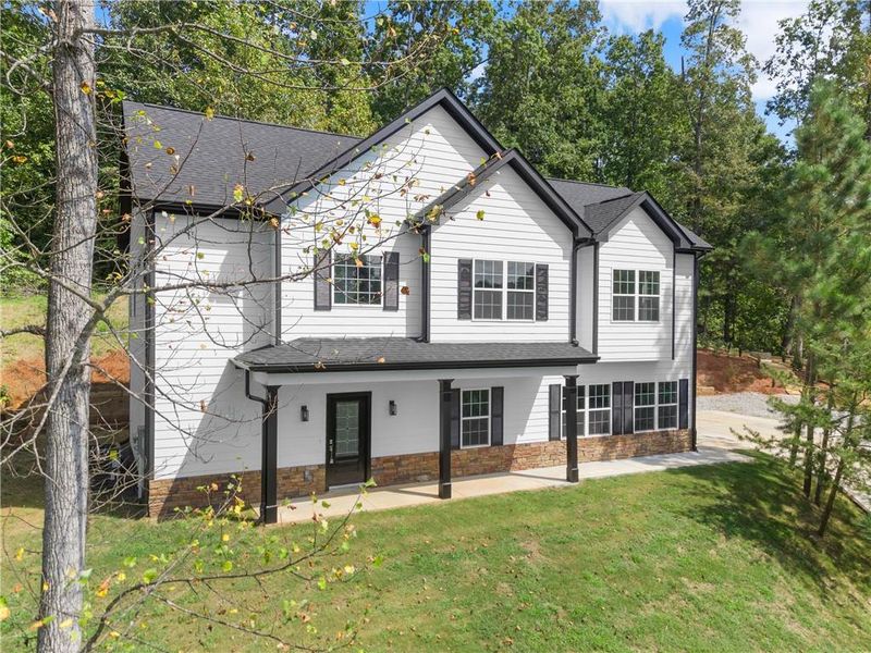 Front exterior of a new home in , Gainesville, GA, highlighting curb appeal (Image 20).