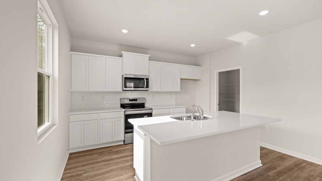 Furnished interior view inside a new home in The Reserve at Calcutta, Stockbridge (Image 5).