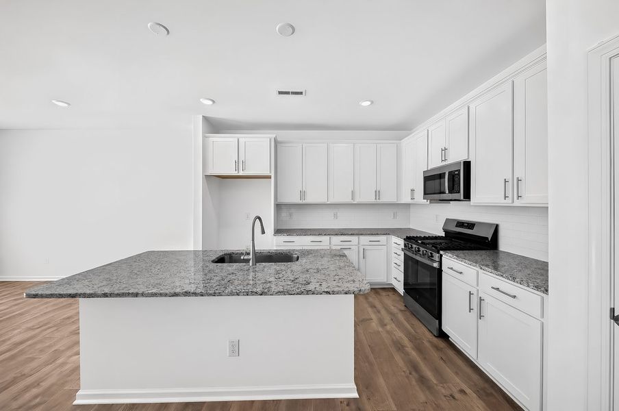 Furnished interior view inside a new home in Magnolia Townes, Wendell (Image 7).