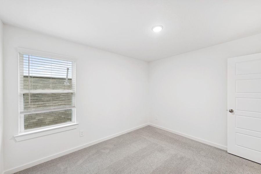 Spacious, unfurnished interior of a new home in Pinewood at Grand Texas, New Caney (Image 5).