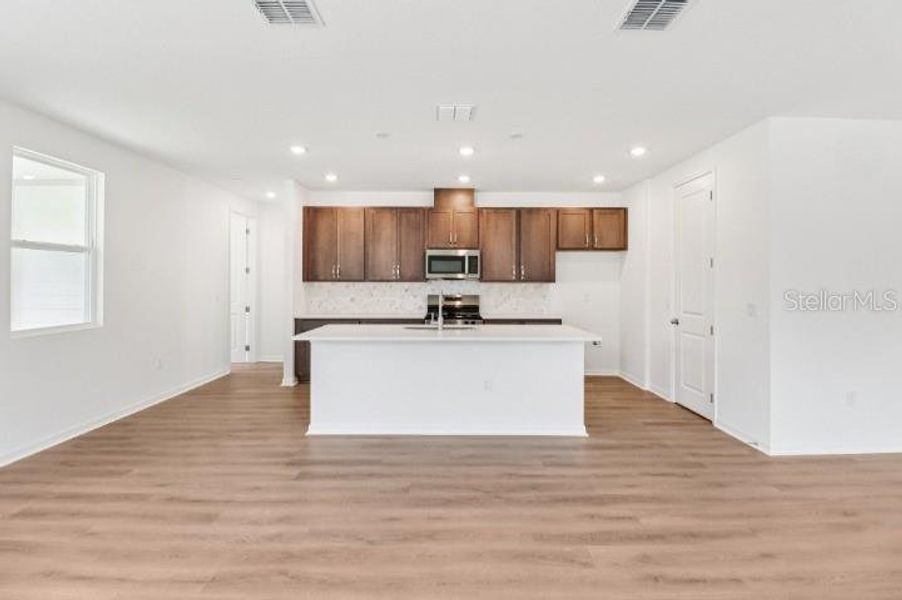 Furnished interior view inside a new home in Northlake at Ovation, Winter Garden (Image 8).