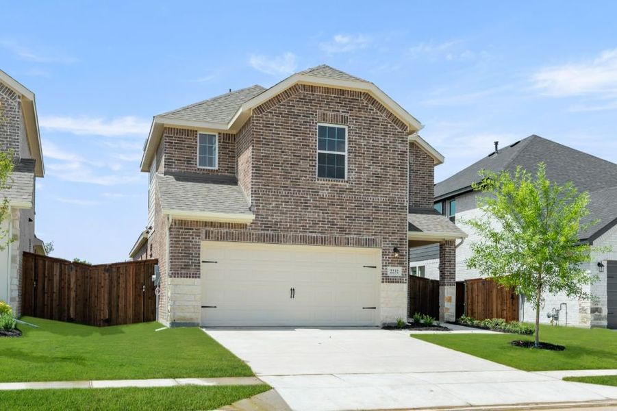 Front exterior of a new home in Creekside, Royse City, TX, highlighting curb appeal (Image 26).
