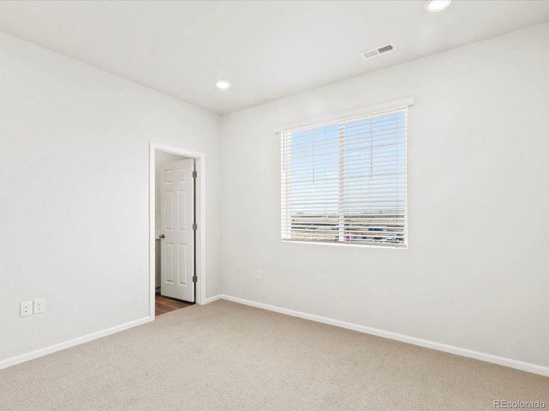 Spacious, unfurnished interior of a new home in Poudre Heights: The Alpine Collection, Windsor (Image 20).