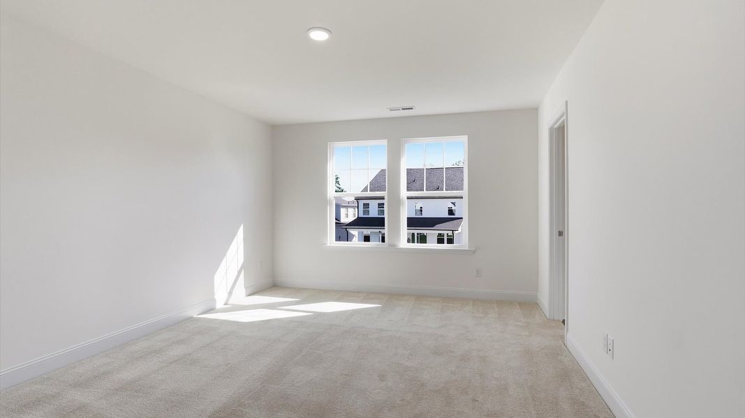 Furnished interior view inside a new home in Sidney Creek Single Family, Zebulon (Image 10).