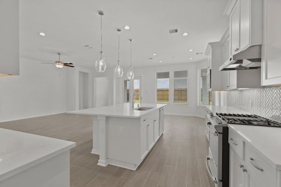 Representative furnished interior of a home built from the Payton by Chesmar Homes in The Highlands, Porter (Image 4).