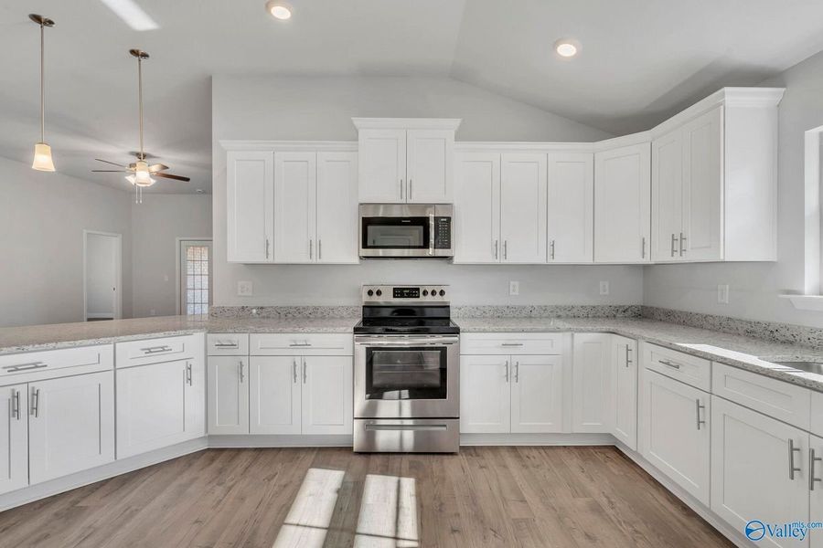 Representative furnished interior of a home built from the 2200 by Adams Homes in Winding Oaks, Weeki Wachee (Image 6). Representative furnished interior of a home built from the 2200 by Adams Homes in Winding Oaks, Weeki Wachee (Image 6).