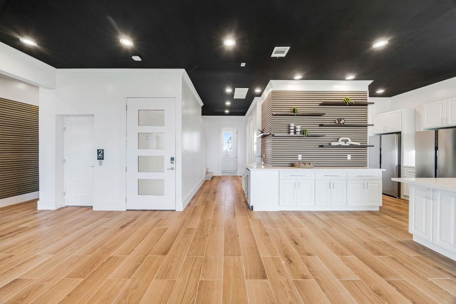 Designated bar area with wine cooler.