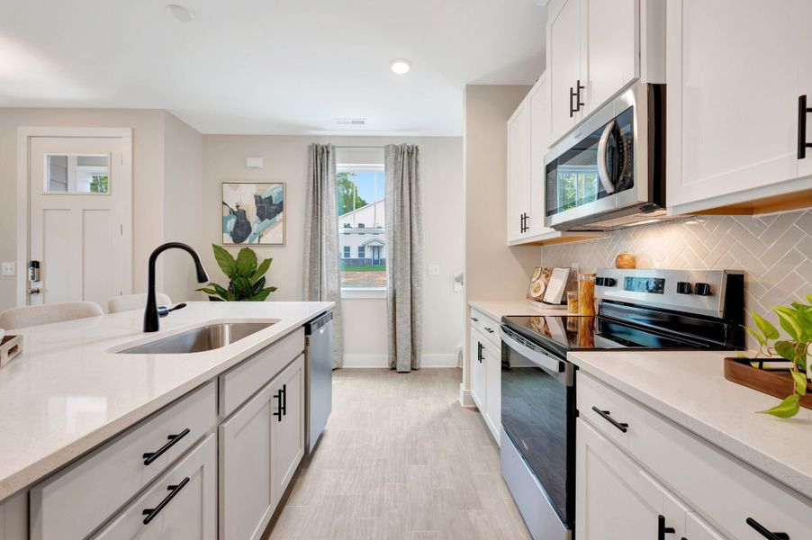 Representative furnished interior of a home built from the Vienna by Mattamy Homes in Ashmore Townes, Garner (Image 9).