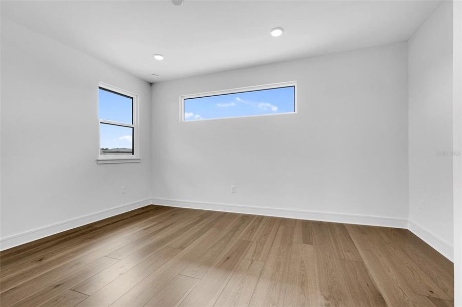 Spacious, unfurnished interior of a new home in Hampton Green at Providence, Davenport (Image 48).