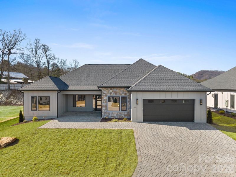 Front exterior of a new home in , Arden, NC, highlighting curb appeal (Image 24).