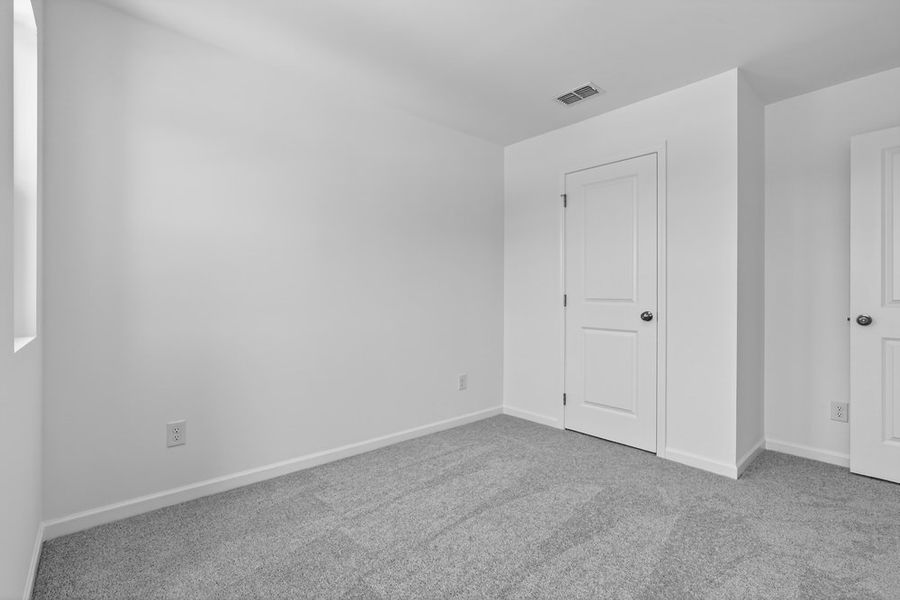 Spacious, unfurnished interior of a new home in Weatherfield, Buford (Image 22).