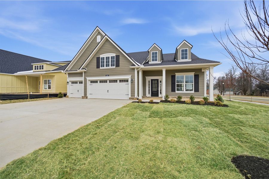 Front exterior of a new home in Dorris Farm, White House, TN, highlighting curb appeal (Image 23).