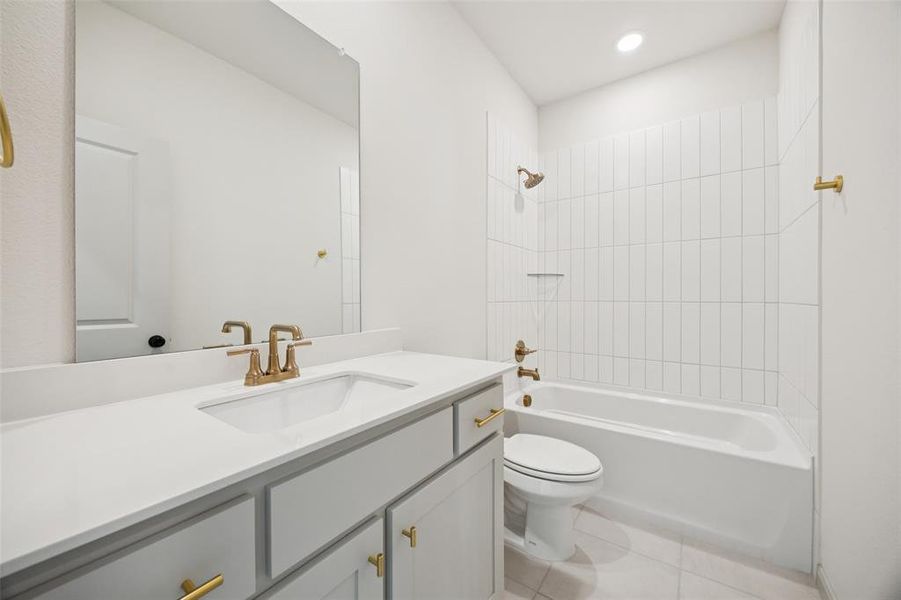 Friends and family will feel right at home in any of the beautifully finished guest baths.