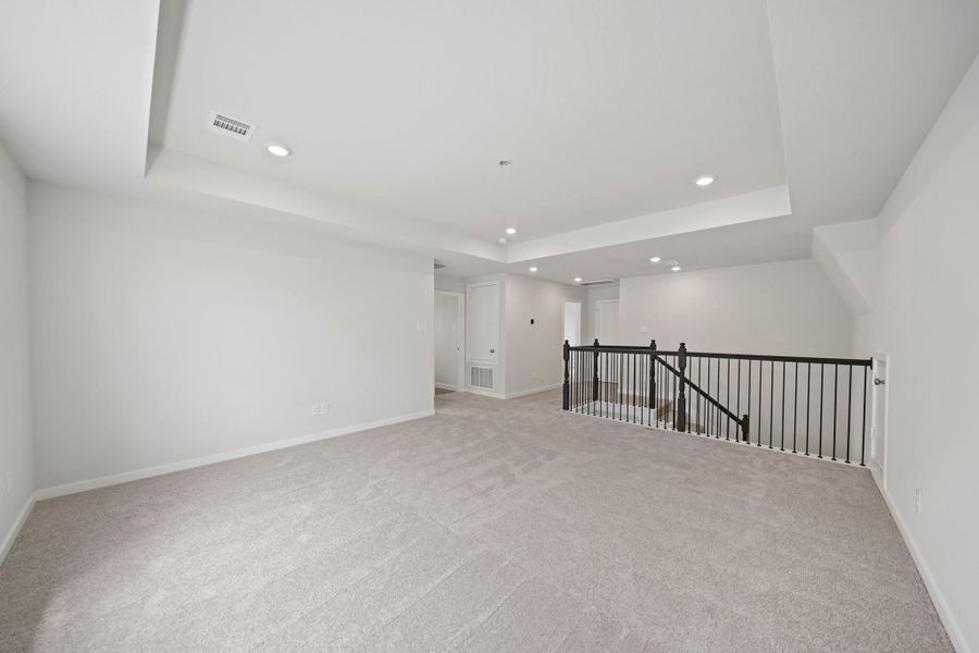 Spacious, unfurnished interior of a new home in Sunterra, Katy (Image 18).