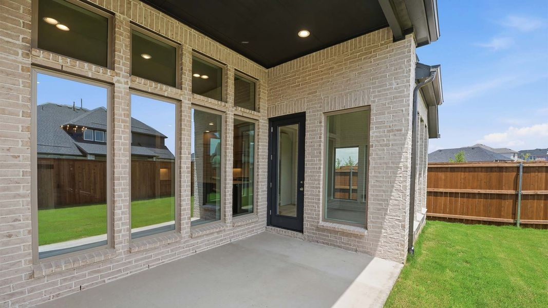 Exterior details and patio area of a home in Cambridge Crossing, Celina (Image 4). Exterior details and patio area of a home in Cambridge Crossing, Celina (Image 4).
