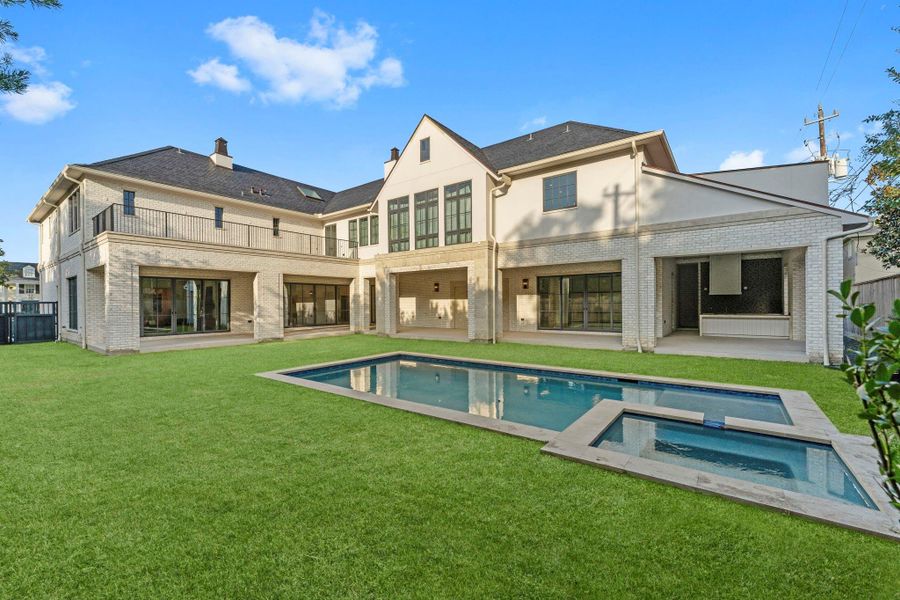 The lush exterior expands beyond the recently completed pool The lush exterior expands beyond the recently completed pool