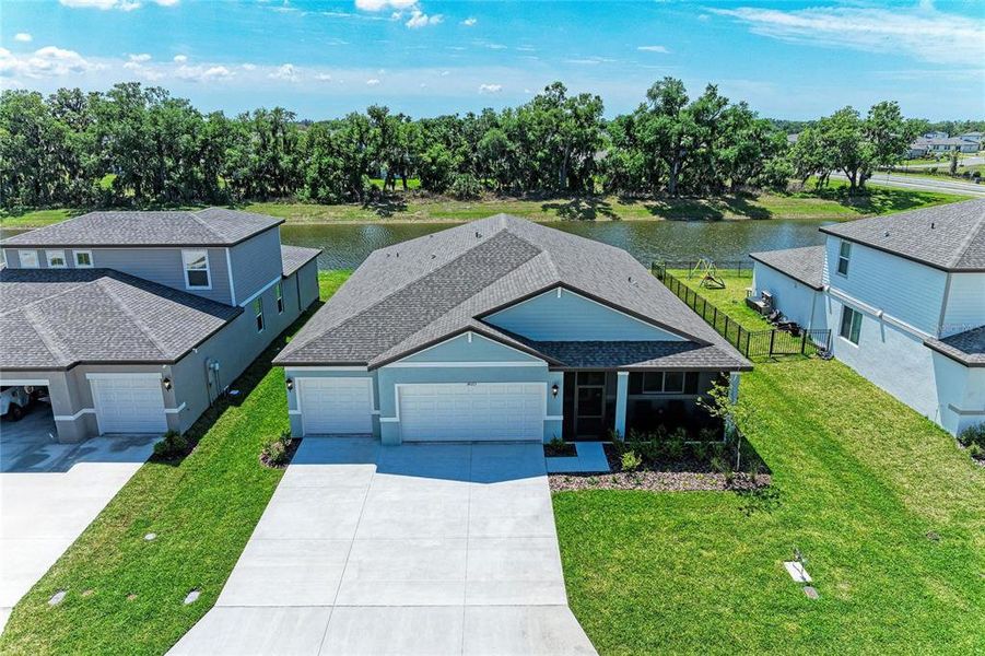 Front exterior of a new home in , Parrish, FL, highlighting curb appeal (Image 1). Front exterior of a new home in , Parrish, FL, highlighting curb appeal (Image 1).