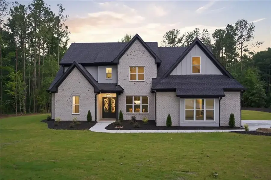 Front exterior of a new home in , Hull, GA, highlighting curb appeal (Image 24).