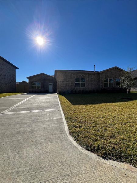Exterior details and patio area of a home in , Spring (Image 13). Exterior details and patio area of a home in , Spring (Image 13).