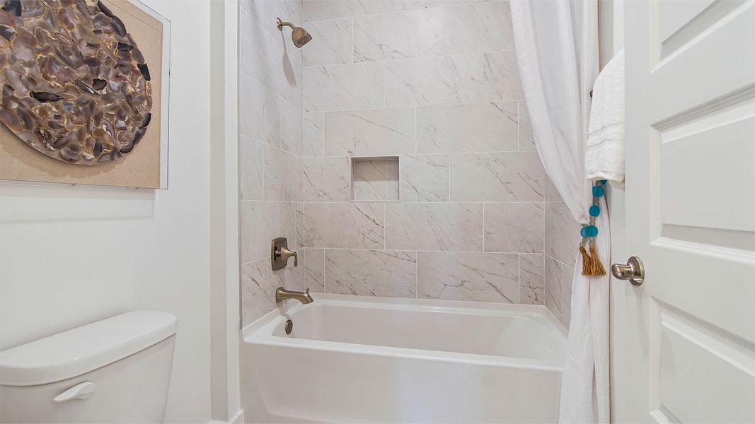 Representative furnished interior of a home built from the Brayden by D.R. Horton in Parkside, Santa Rosa Beach (Image 42).