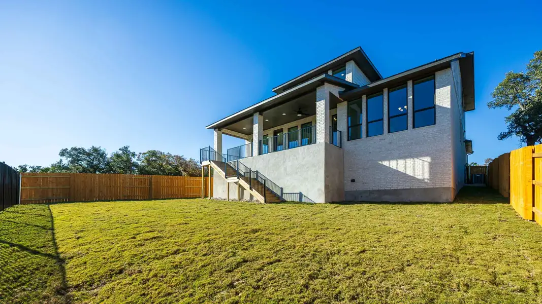 Exterior details and patio area of a home in Parkside On The River 60', Georgetown (Image 2).