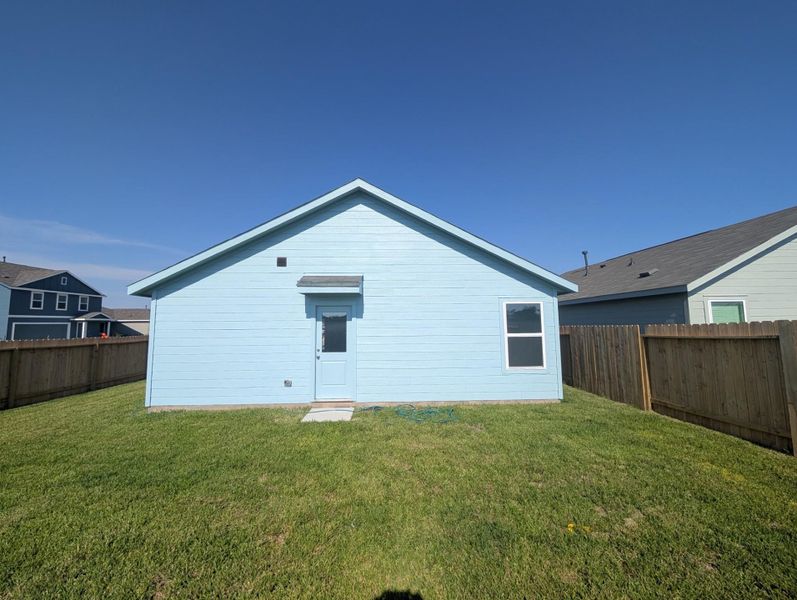 Exterior details and patio area of a home in Wharton Lakes: Cottage Collection, Wharton (Image 3). Exterior details and patio area of a home in Wharton Lakes: Cottage Collection, Wharton (Image 3).