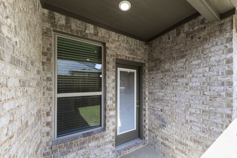 Front exterior of a new home in Sereno Oaks, Dallas, TX, highlighting curb appeal (Image 29). Front exterior of a new home in Sereno Oaks, Dallas, TX, highlighting curb appeal (Image 29).