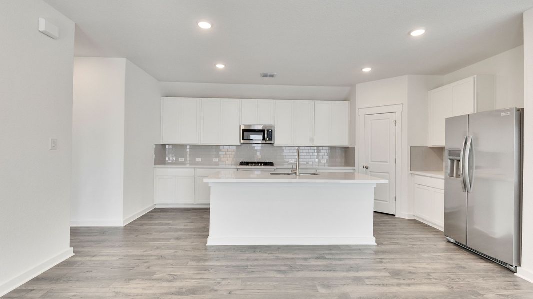 Furnished interior view inside a new home in Creeks Crossing, Elgin (Image 4).