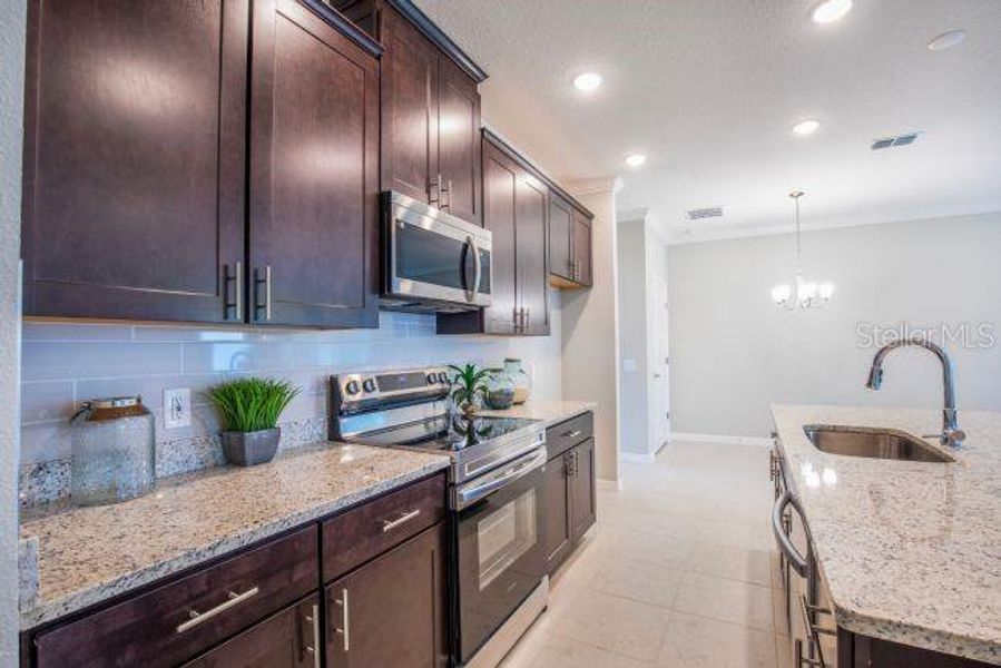 Furnished interior view inside a new home in Ormond & Daytona Beach, Ormond Beach (Image 13).