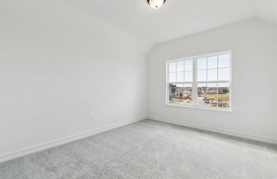 Spacious secondary bedroom with large windows Spacious secondary bedroom with large windows