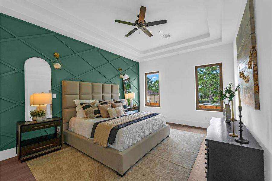 Step inside the owner's oasis with elegant feature wall, sconces, & windows overlooking the backyard Step inside the owner's oasis with elegant feature wall, sconces, & windows overlooking the backyard