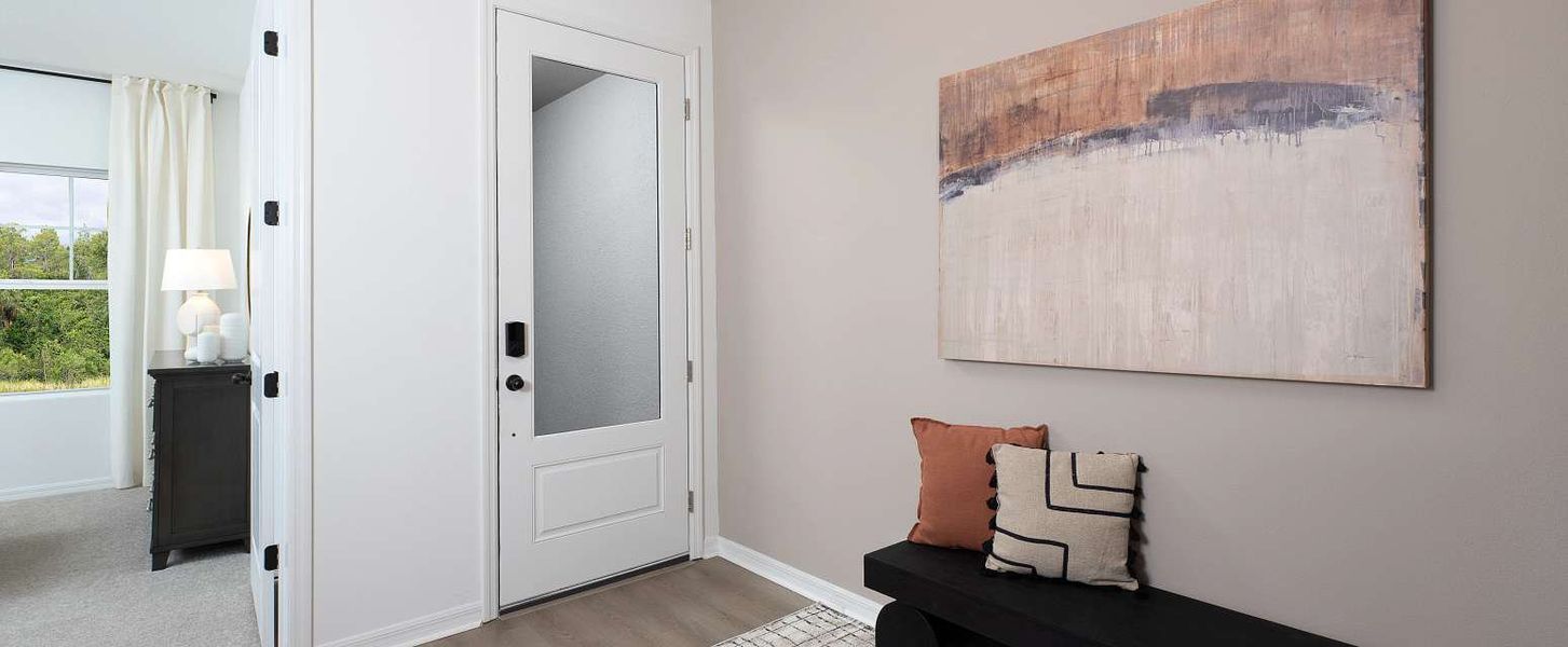 Representative furnished interior of a home built from the Badland by Ashton Woods in Catamaran Cove Traditional, Rockledge (Image 4).