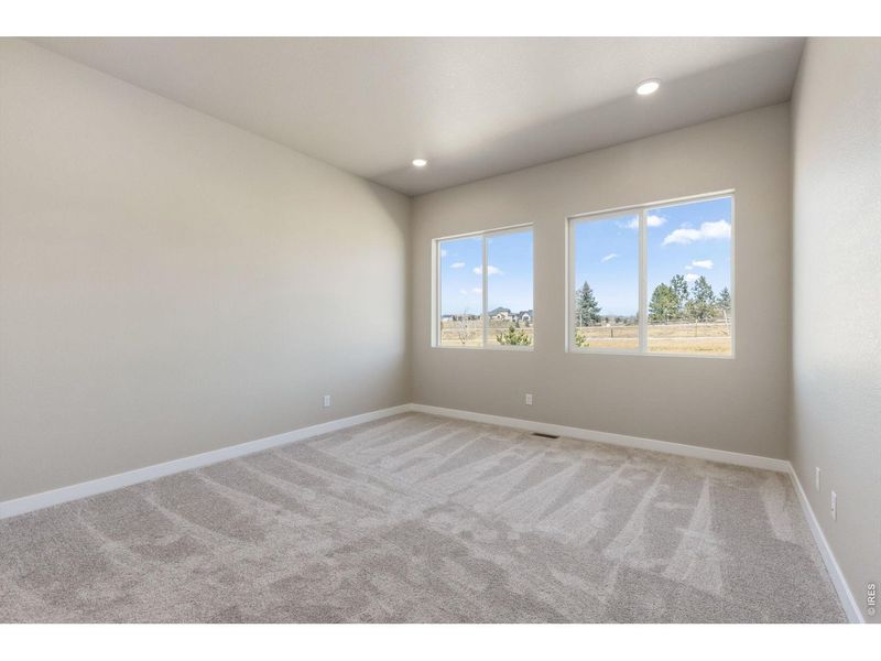 Spacious, unfurnished interior of a new home in Highlands Preserve, Mead (Image 14).