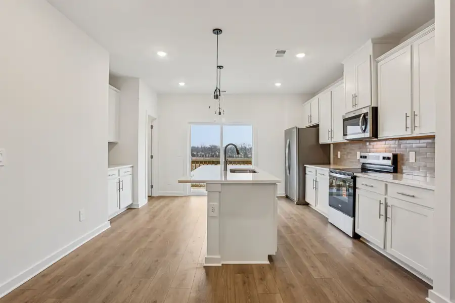 Furnished interior view inside a new home in Greystone - Highland Townhomes, Smyrna (Image 5).