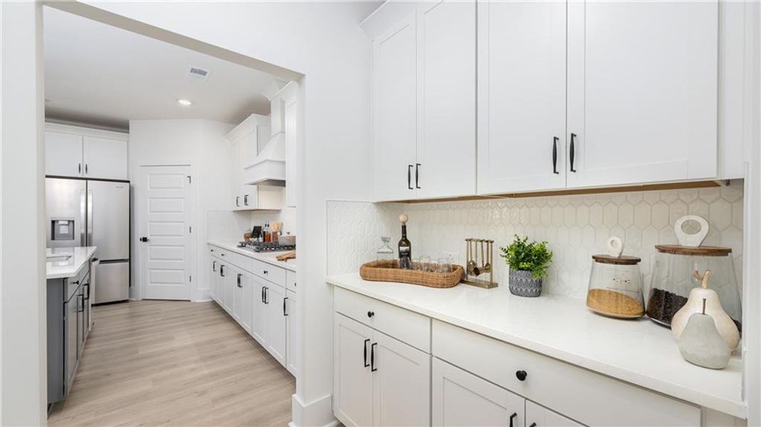 Furnished interior view inside a new home in The Village at Sandy Plains, Marietta (Image 32).