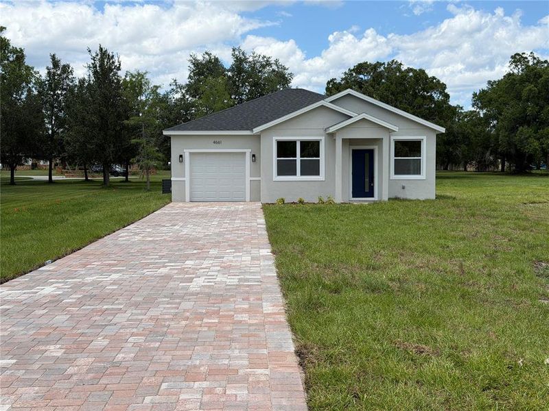 Front exterior of a new home in , St. Cloud, FL, highlighting curb appeal (Image 15). Front exterior of a new home in , St. Cloud, FL, highlighting curb appeal (Image 15).