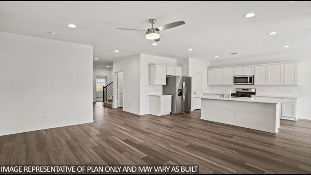 Representative unfurnished interior of a home built from the Midland by D.R. Horton in Sunterra, Katy (Image 17).