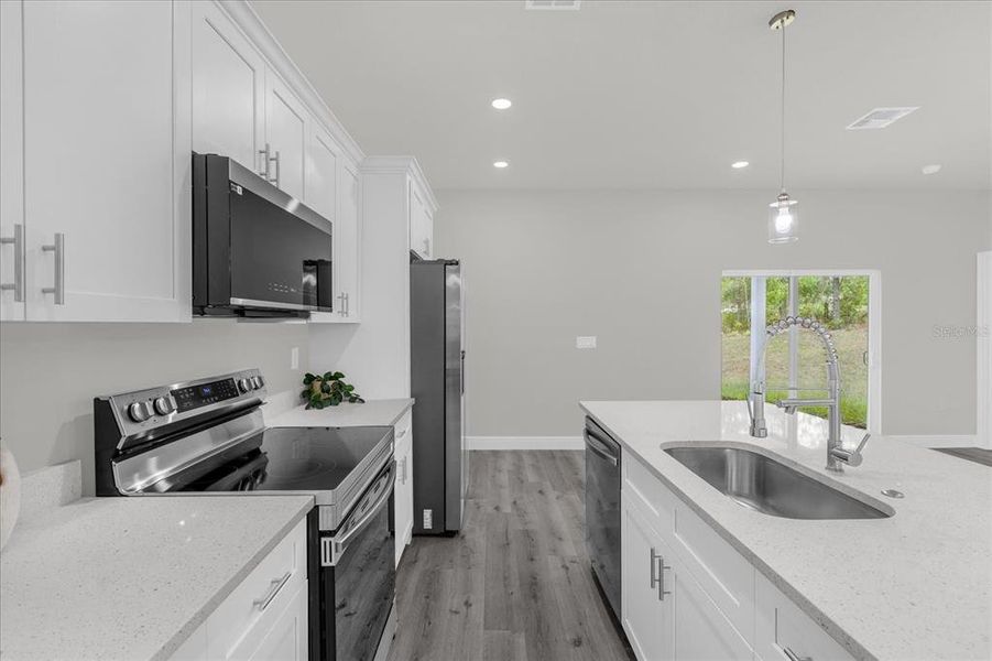 Furnished interior view inside a new home in , Dunnellon (Image 10).