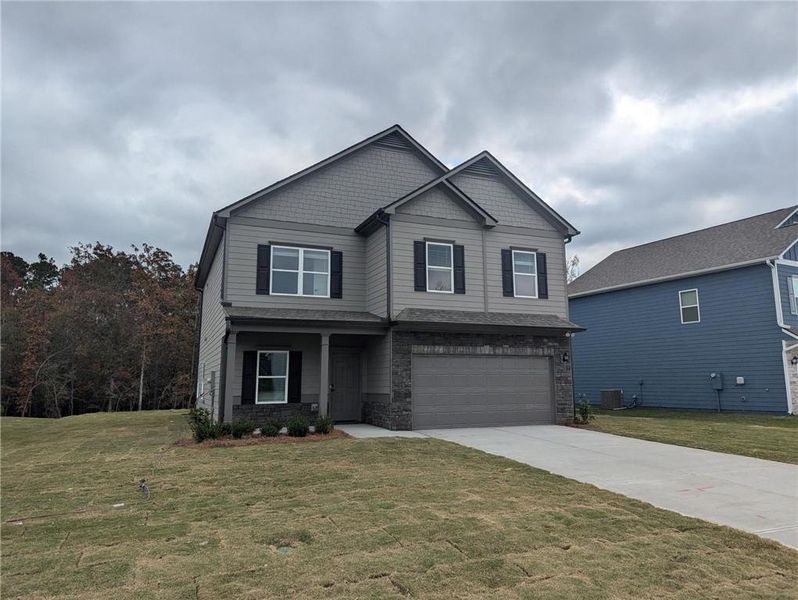Front exterior of a new home in , Rome, GA, highlighting curb appeal (Image 1). Front exterior of a new home in , Rome, GA, highlighting curb appeal (Image 1).