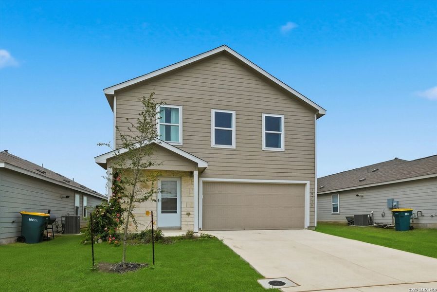 Front exterior of a new home in , Converse, TX, highlighting curb appeal (Image 1). Front exterior of a new home in , Converse, TX, highlighting curb appeal (Image 1).