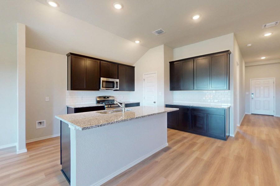 Furnished interior view inside a new home in Carillon, Manor (Image 6).