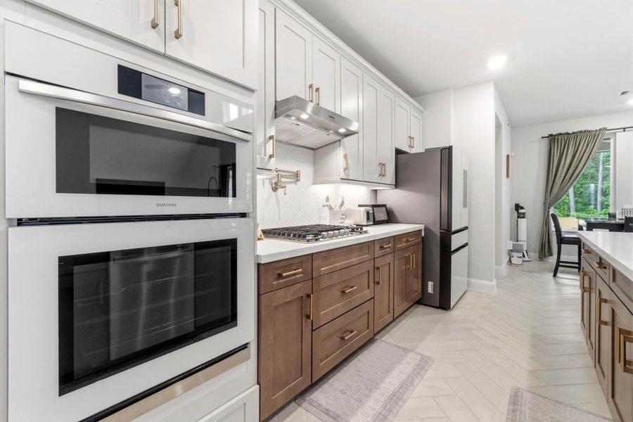 Furnished interior view inside a new home in , Magnolia (Image 6).
